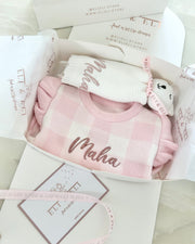 Personalised knitted baby ruffle romper in pink and white check - view 5 | Eli&Eli