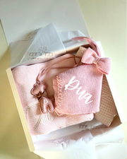 Knitted bow comforter and pacifier holder in pink - view 3 | Eli&Eli