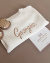 Knitted cotton baby jumper in coco white - Eli&Eli Dubai