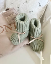 Knitted wool baby booties in sage green - view 2 | Eli&Eli