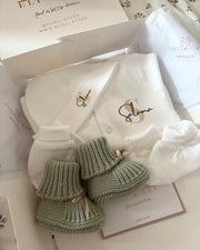 Knitted wool baby booties in sage green - view 3 | Eli&Eli