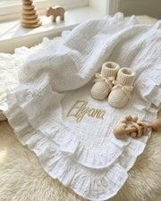 Luxury ruffle muslin baby blanket in white - view 2 | Eli&Eli