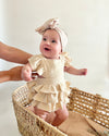Mini princess ruffle muslin romper in sand beige with embroidered name - Eli&Eli Dubai