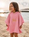Personalised hooded muslin poncho towel in candy peach for babies and kids - Eli&Eli Dubai