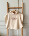 Personalised hooded muslin poncho towel for babies and kids in beige - Eli&Eli Dubai