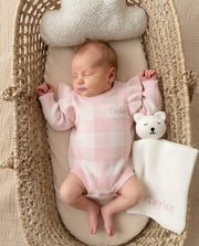 Personalised knitted baby ruffle romper in pink and white check - view 2 | Eli&Eli