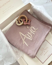 Personalised cotton muslin baby swaddle blanket, selection of colours - view 2 | Eli&Eli