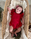 Ruffled red muslin Christmas romper for baby girls - Eli&Eli Dubai
