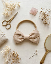 Tiny baby headband with golden dots in beige - view 2 | Eli&Eli