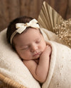 Tiny baby headband with silk bow in beige - Eli&Eli Dubai