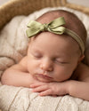 Tiny baby headband with silk bow in green - Eli&Eli Dubai