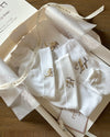 Two personalised hospital and baby shower gift sets de luxe, moon stars and gold signature letter - Eli&Eli Dubai