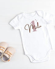 Personalised baby onesie with year and name in beige - view 3 | Eli&Eli