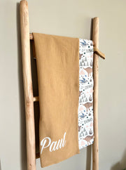 Personalised muslin baby blanket with brown dinosaurs - view 4 | Eli&Eli