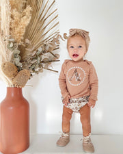 Signature print long sleeve baby onesie in white - view 9 | Eli&Eli