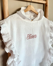 Ruffled muslin poncho with embroidery in white - view 7 | Eli&Eli